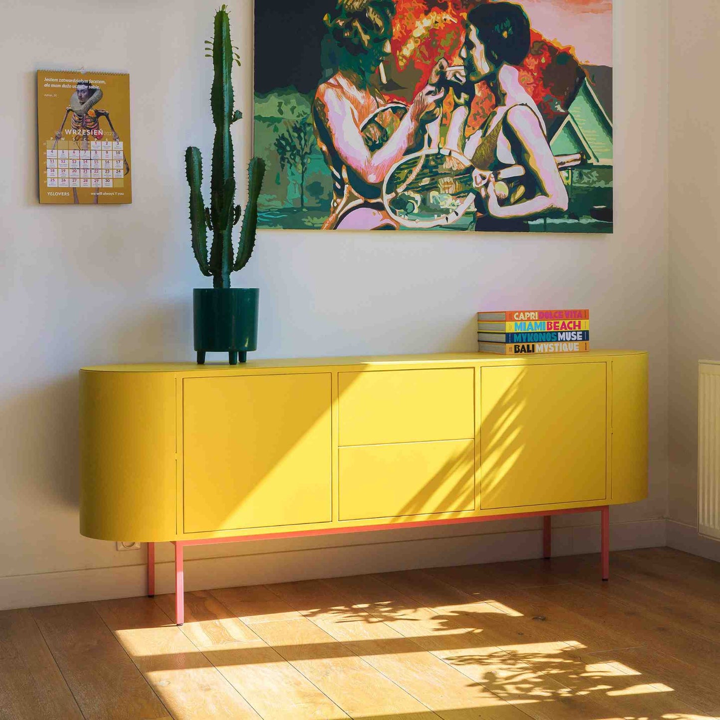 ÉTAUDORÉ Desiva Lumia 01 steel rounded sideboard in lemon yellow powder coated steel with ruby red legs