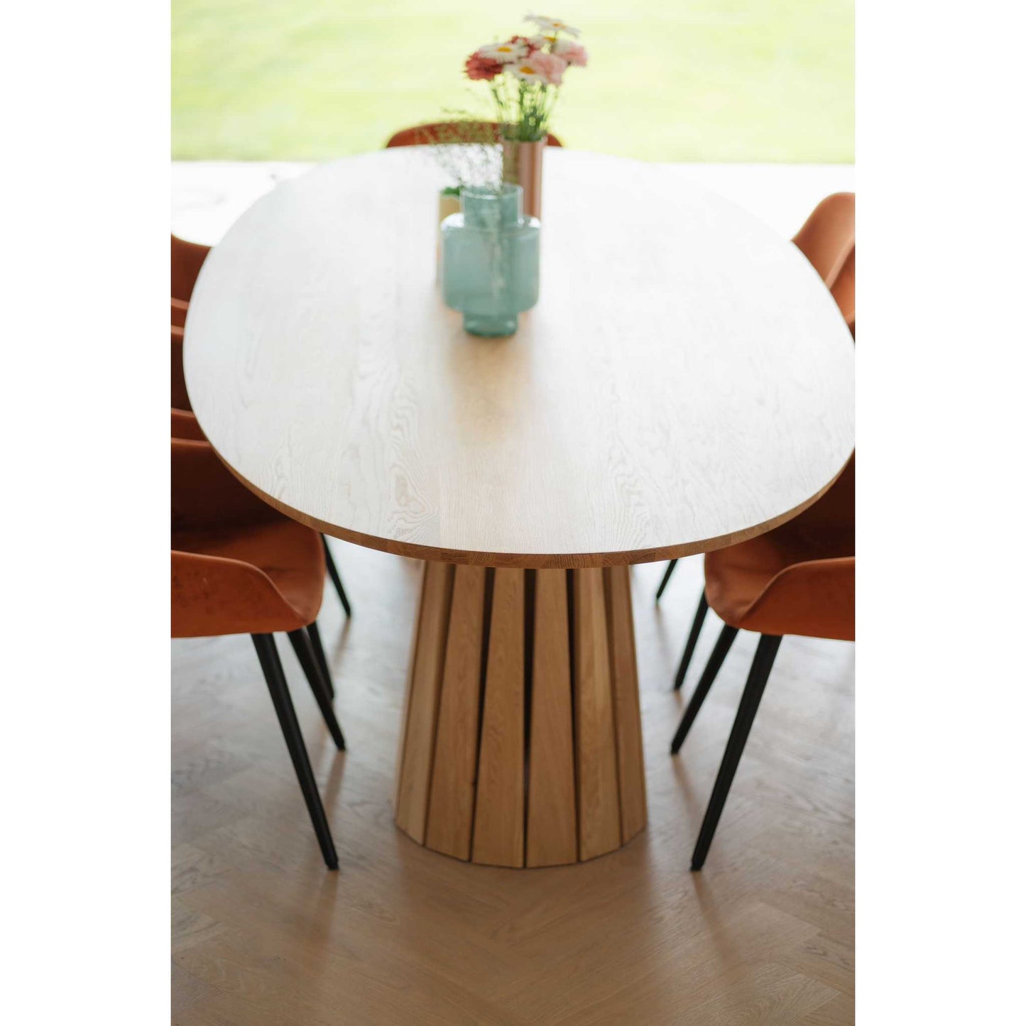 Top view of the ÉTAUDORÉ Noemi Rounded Oval Table made from solid oak wood in raw finish, designed in collaboration with Noemi Gwalter Rubino