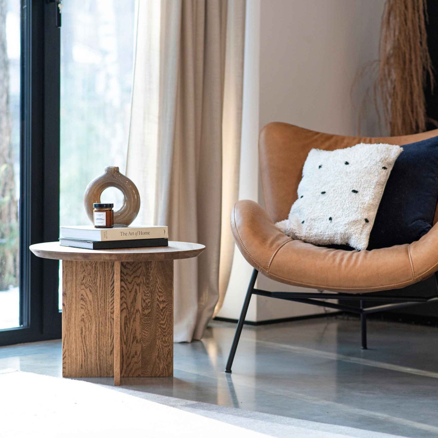 Interior arrangement with the ÉTAUDORÉ Cross Base Otemma Coffee Table made from solid oak wood in dark finish