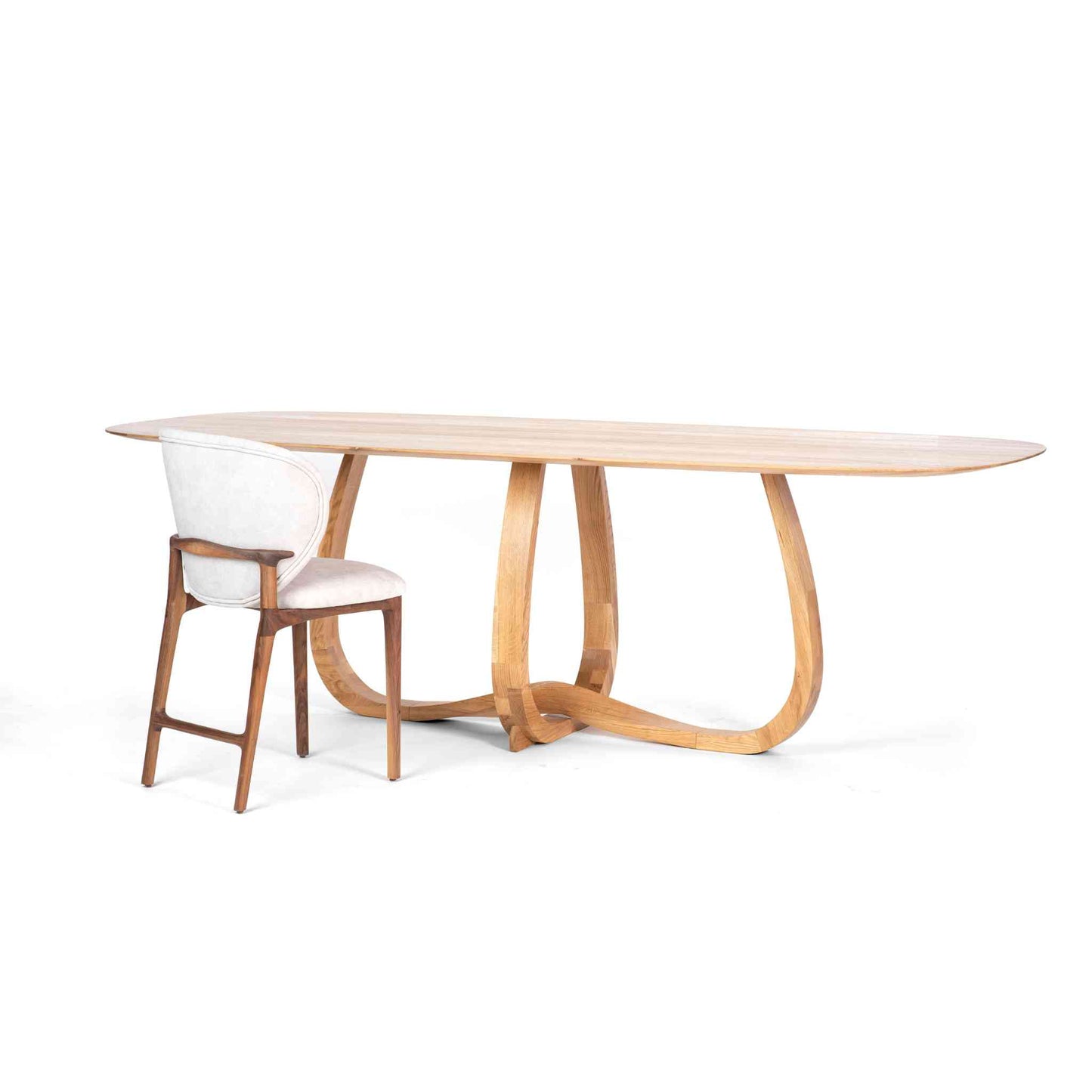 Interior arrangement with the Oval Eiger Solid Oak Wood Table with a beautiful intertwined loop base and an Uetliberg chair