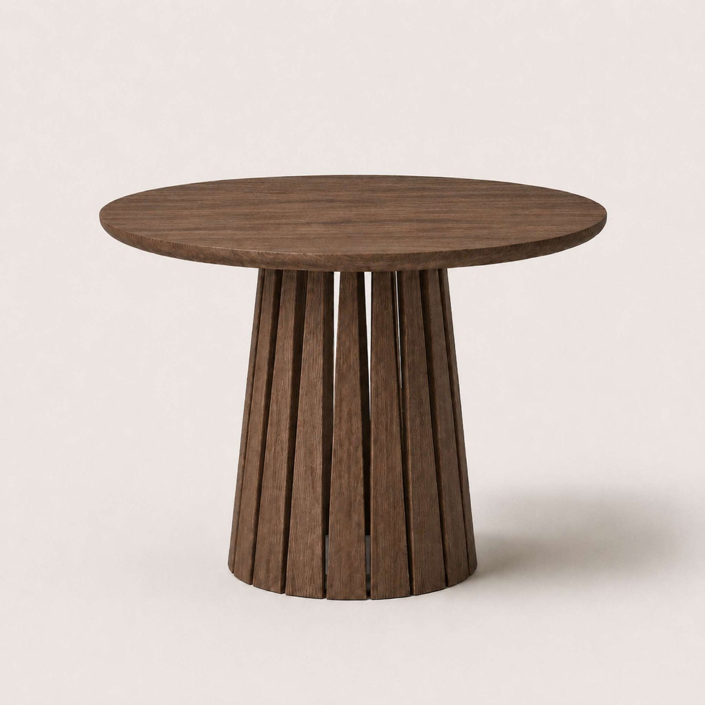 Round Rigi table from ÉTAUDORÉ in solid oak wood with a beautiful base in a graphite finish