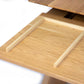 Tray detail of the Cervin Desk with a unique hourglass shape in solid oak wood