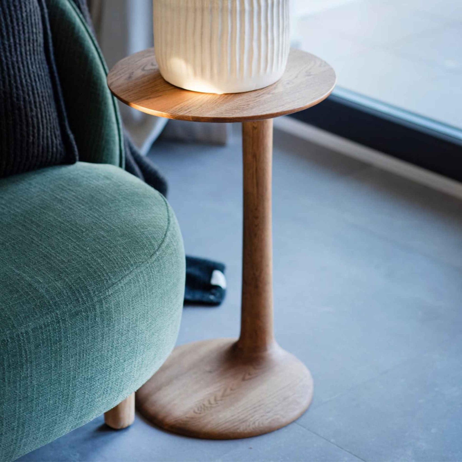 Top-down view of the ÉTAUDORÉ Albula tabletop emphasizing its rounded form and smooth edges