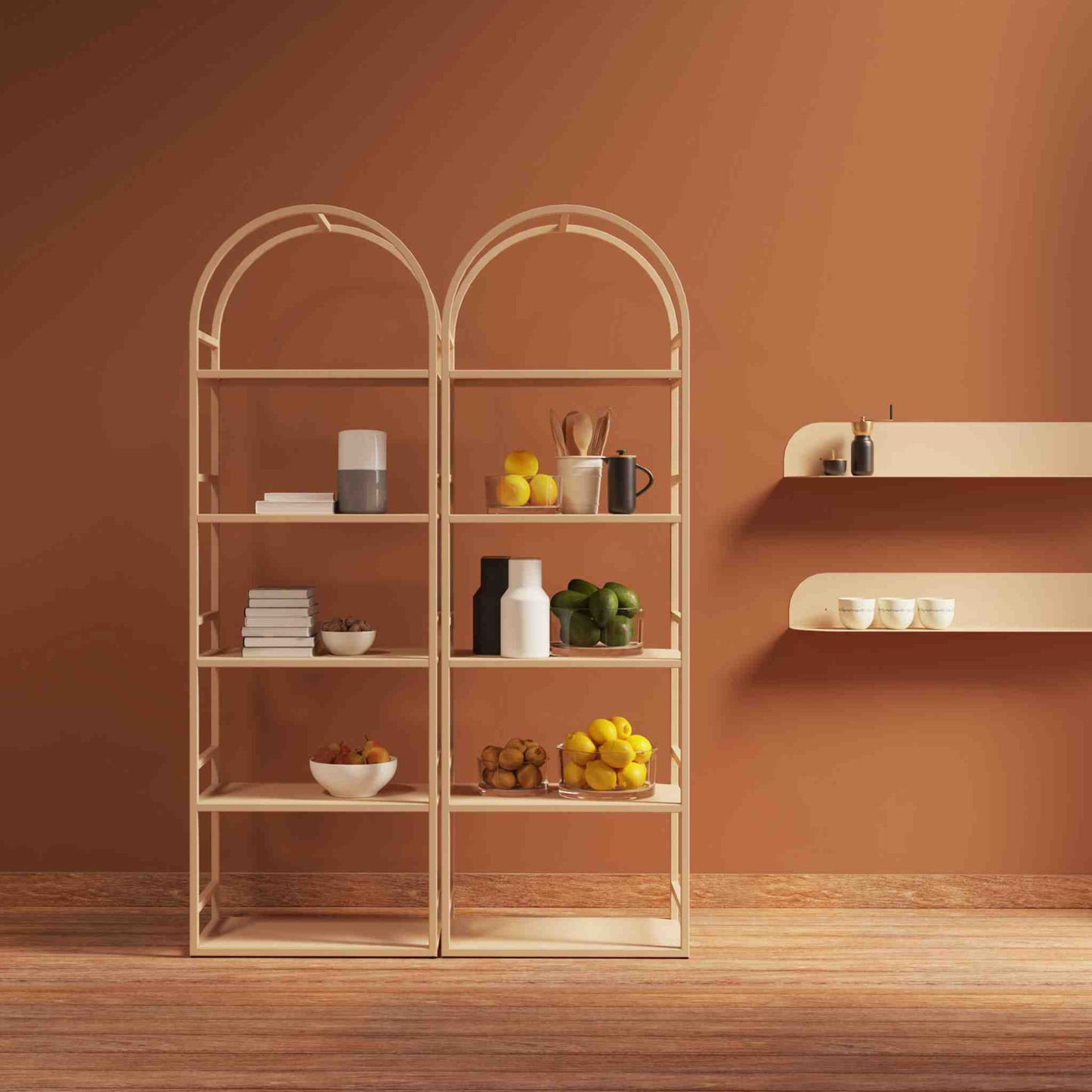 Interior arrangement with the arched bookcase Arkada, available in Switzerland through ÉTAUDORÉ, made from highest quality powdered coated steel in pastel salmon color