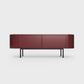 Curved Desiva Enna 01 lowboard in burgundy red color steel, available in Switzerland via ÉTAUDORÉ