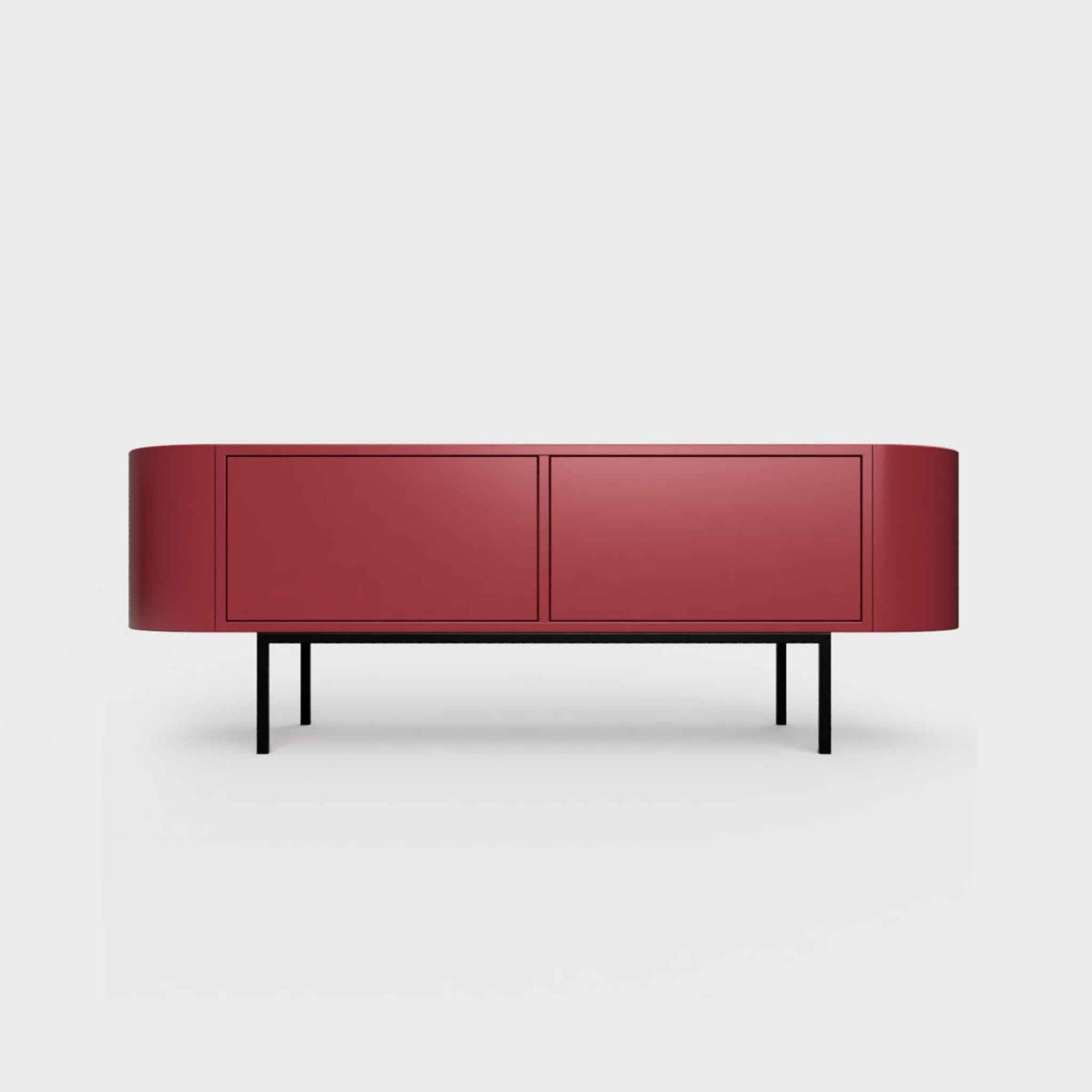 Curved Desiva Enna 01 lowboard in ruby red color steel, available in Switzerland via ÉTAUDORÉ