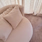 ÉTAUDORÉ Isola Armchair with swivel base – top view in MARE 02 fabric, styled in a modern interior setting