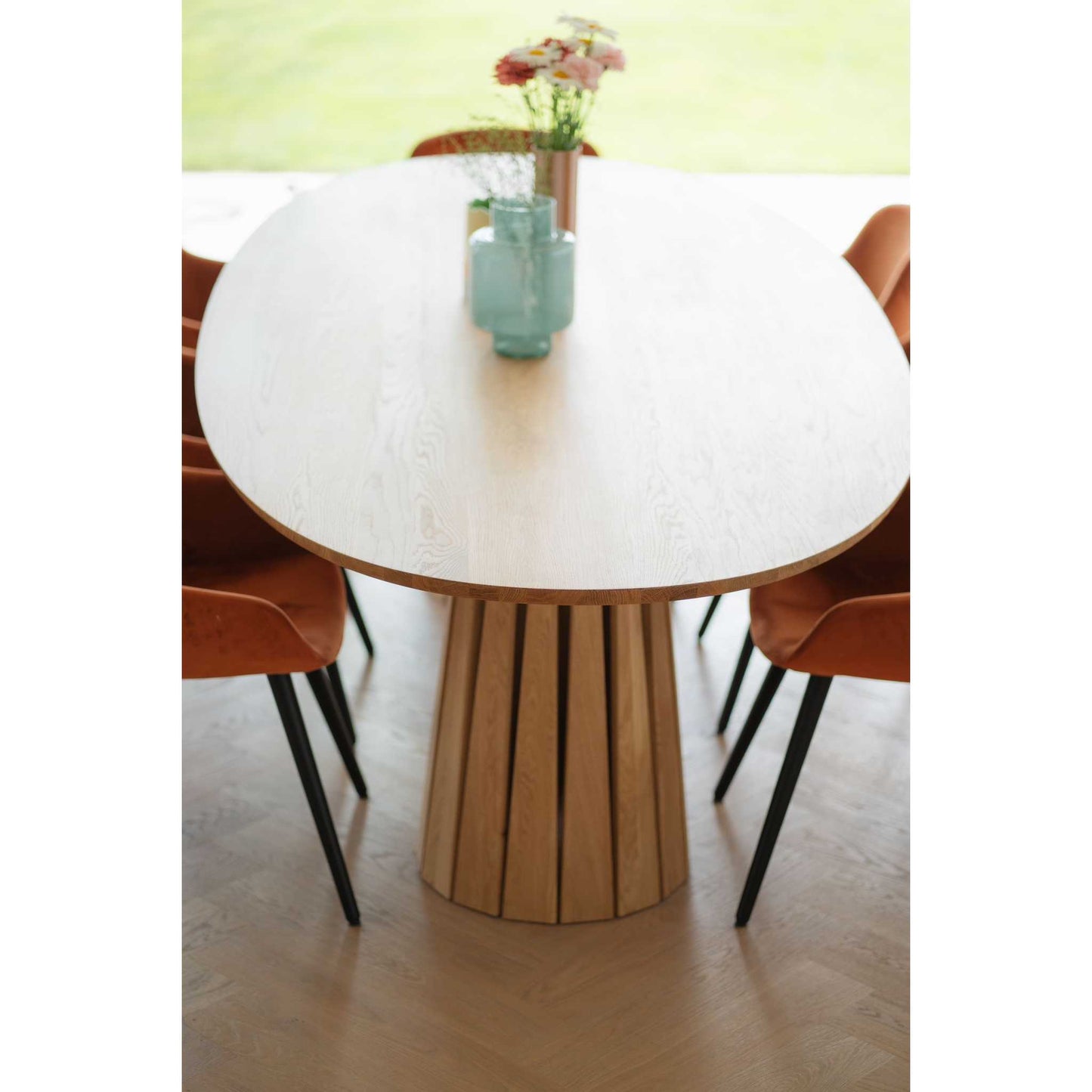 Top view of the ÉTAUDORÉ Noemi Rounded Oval Table made from solid oak wood in raw finish, designed in collaboration with Noemi Gwalter  Rubino