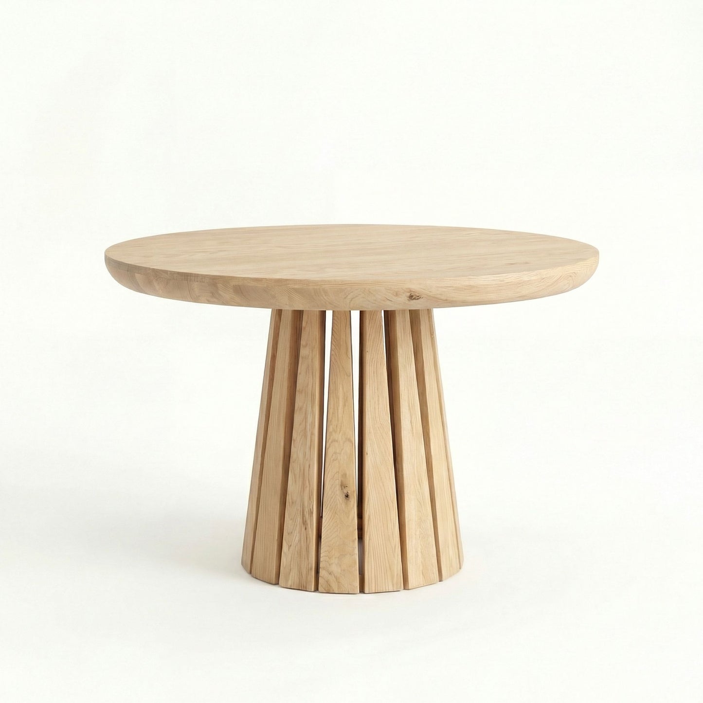 ÉTAUDORÉ Rigi extendable round table in raw finish