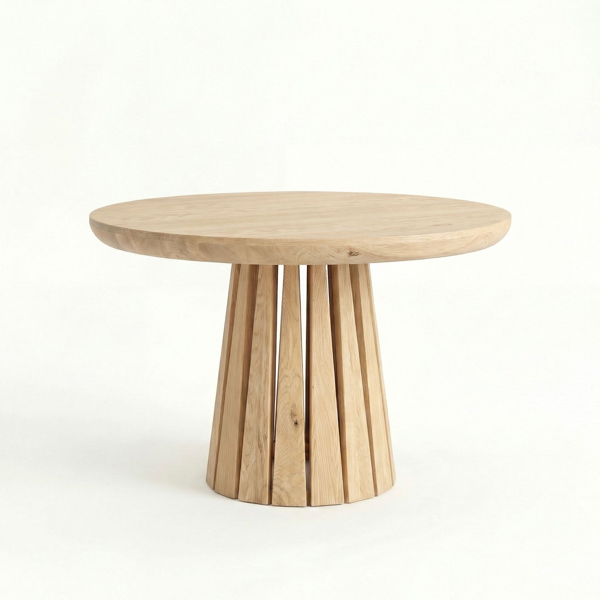 ÉTAUDORÉ Rigi extendable round table in raw finish