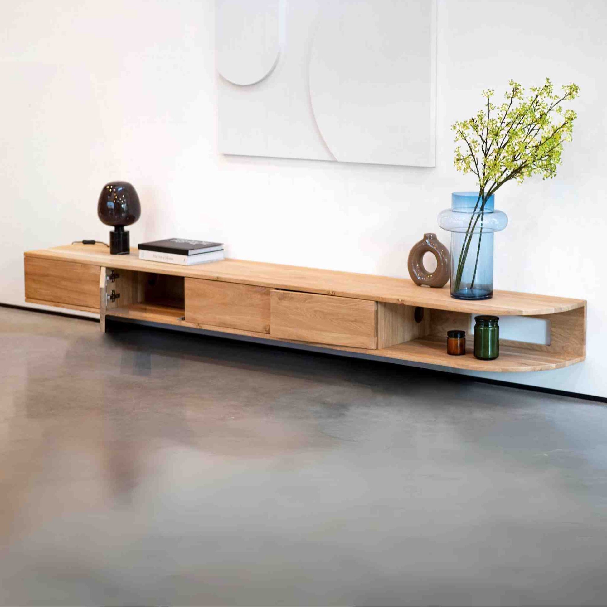 ÉTAUDORÉ San Salvatore wall mounted TV cabinet with one rounded edge, made to order from solid oak wood