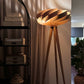 Handmade wooden floor lamp with three ash legs and sculptural cloud-shaped crown