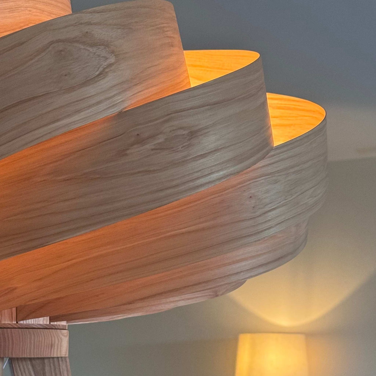 Close-up of natural ash wood grain and oil-wax finish on Cloud lamp
