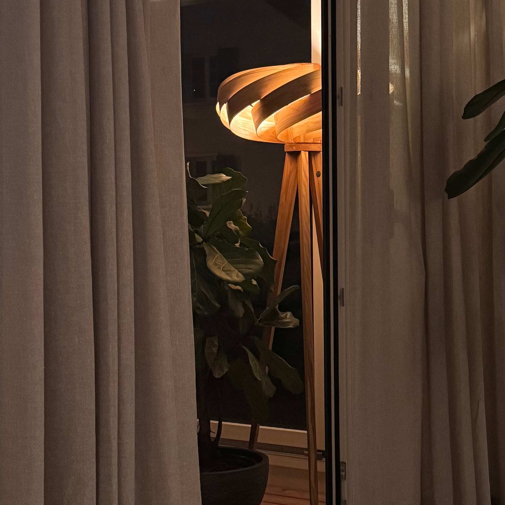 Cloud sculptural lamp in a living room interior, blending art and light